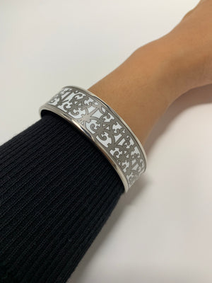 Hermès Silver and White pattern bracelet.-New Neu Glamour | Preloved Designer Jewelry, Shoes &amp; Handbags.